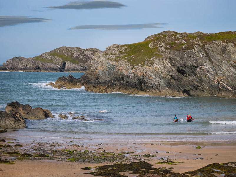 Porth Dafarch Beach with a small party of Coasteeriers heading out