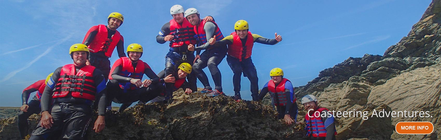 Jumping into the sea on a coasteering and rock climbing excursion